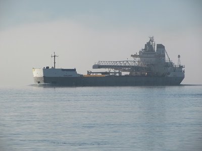 Calumet moving up river with no current destination given.