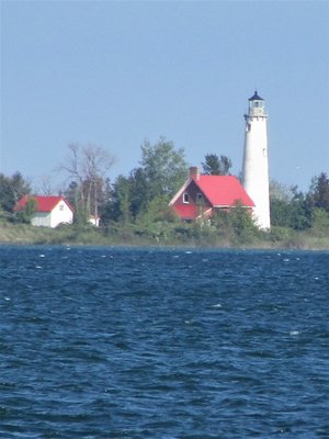 2017-06-04d Tawas Point Light from across the bay.jpg