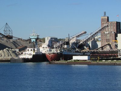Philip R. Clarke inching into position at the North Dock as Clyde S. VanEnkevort/Great Lakes Contender continued to load at the South dock.