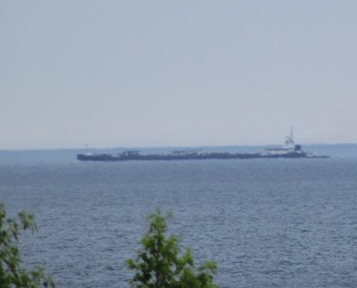 Out on the horizon, the tanker barge Michigan on her way to Cheboygan.