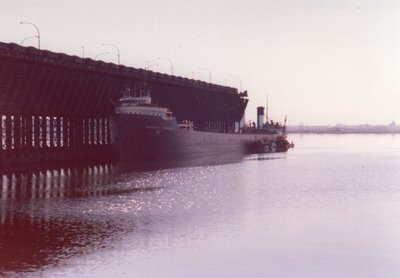 Enders M. Voorhees at West of #5 with Fraser Shipyard work boat/barge along side.