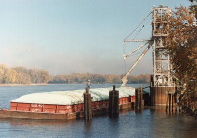 Barge loading grain in LaCrosse at Cargill elevator. 10/22/88.