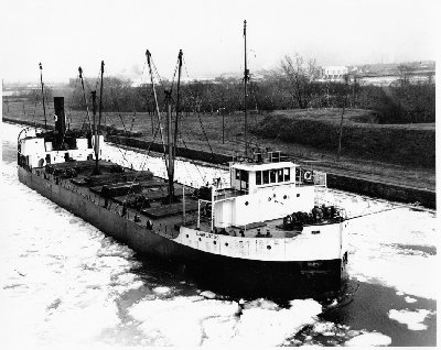 Lawrendoc in the Canadian Sault canal passing the railroad bridge. Photo by Gord Macaulay.