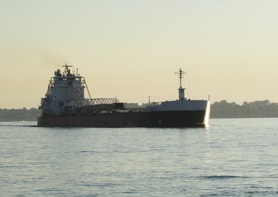 Early morning sun glints off Buffalo's bow.  She's on her way to Cleveland.