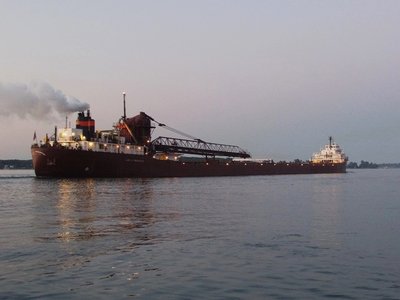Lee A. Tregurtha makes barely a ripple in passing, on another trip to the AK-Rouge plant in Dearborn.
