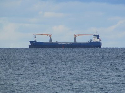 Took this telephoto shot of the saltie Beauforce -- with a destination of Three Rivers -- at anchor Sunday, waiting for the River Float-Down to finish.