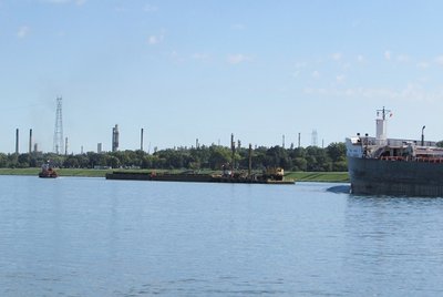 In no time, Victory overtook the string of barges...