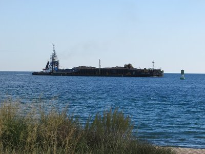Tug Leonard M and barge approaching the Bluewater Bridges, down-bound to Windsor.