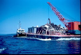 The Tug Colombe pushing the barge Beaver