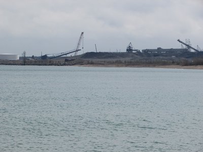 My view of LAT from the city park.  Her stack and boom are just ahead of the white storage tank.