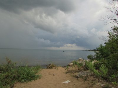 Threatening skies gave way to torrential rains.  When it was over, I headed to the lake and waited...and waited...and waited for a rainbow.  There was a faint one, but too faint to photograph.