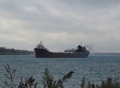 Lee A. Tregurtha (Marquette) under thick morning clouds.
