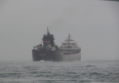 Impressive view of Kaye E. Barker (Grand Haven) entering the choppy waters of Lake Huron just above the Bluewater Bridges.