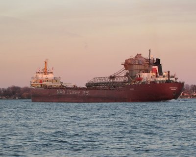Frontenac (Thunder Bay) reflecting the glow of the setting sun.