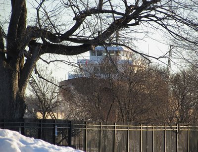 The Soo Lock Property is closed and most popular vantage points are inaccessible due to snow banks and drifts. This was a better view than through the fences.  At Sherman Park, snow drifts were nearly knee-high but (even when you're 5' and shrinking every day) where there's a will...