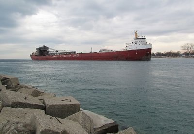 After delivering one last cargo of road salt in Chicago, Frontenac glides off Lake Huron for lay-up and a well earned rest for her crew.