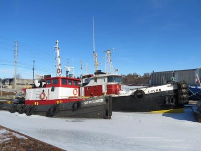 Tugs Neptune III and Dover.