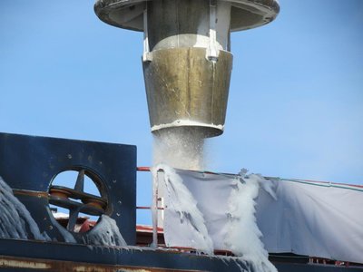 Loading salt into the first cargo hold.