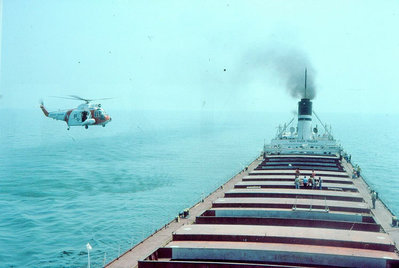 Rescue of Crewman Trader 1981_edited.jpg (87.84 KiB) Viewed 4940 times The USCG Chopper nearing the open hatch.