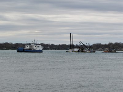 Drummond Islander II and barges headed for Lexington, make barely a ripple as they creep along the St. Clair River at 2.5 mph.