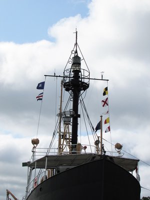 A stiff breeze played among the pennants flying on the Huron Light Ship.