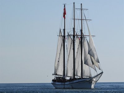 The incredible beauty of the day, the sky, and those white sails.........