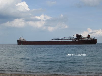 Thunderheads build as Lee A. Tregurtha enters Lake Huron, with a Marquette destination.