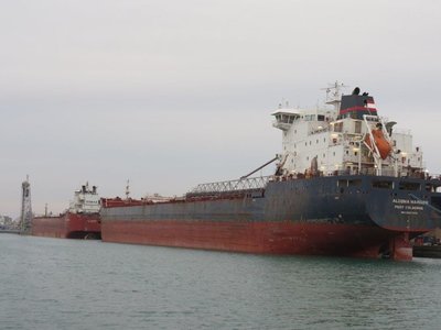 CSL Laurentien and Algoma Mariner at Wharf 16, R &amp; P Coal dock in Port Colborne, Ontario.