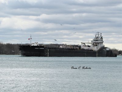 Tug Leo A. McArthur maneuvers tanker barge John J. Carrick into position at the Corunna Fuel Dock.