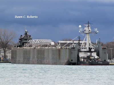 Tug Defiance and barge Ashtabula at the Sarnia Harbor dock.