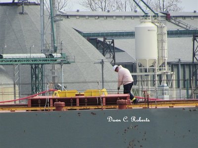 Manitowoc deckhand getting ready for work down river.