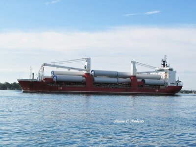 Saltie Josef (Duluth) passing Marine City loaded with wind turbine tower sections.