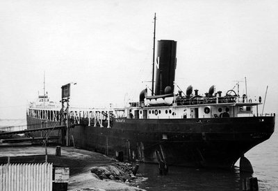 Nicholson Trans. Str.'Mataafa' loading autos. Blt Cleveland S.B. Co. in 1899 -- 450.25'x50'x25. Wreck. on Duluth shore Nov-'05. Conv. to auto carrier '47. Given 'flight-deck'-'50. Scrapped in '65..jpg