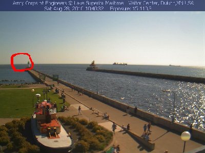 looks like there are 2 ships anchored and a little black dot on the horizon (circled in red) that looks like a ship