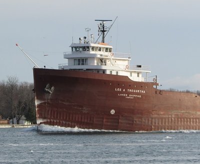 As she plows through the water, in ballast for Sturgeon Bay, Lee A Tregurtha collects ice along the water line and on her bow.