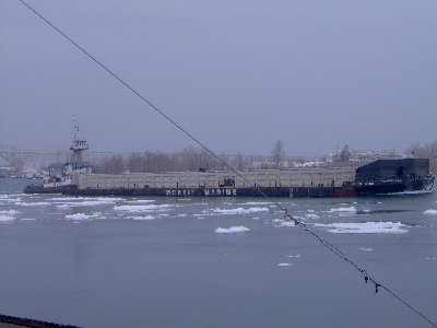035.JPG (293.75 KiB) Viewed 2190 times Salvor pushing the Niagara Spirit. January 13, 2009