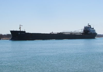 Algowood, in ballast, making her way up-river to Goderich.